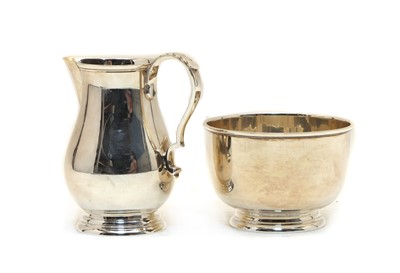 Lot 54 - A silver cream jug and sugar bowl