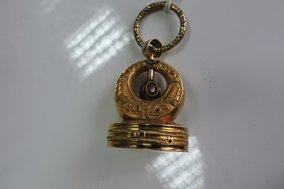 Lot 47 - A Regency gold and enamel musical seal/fob