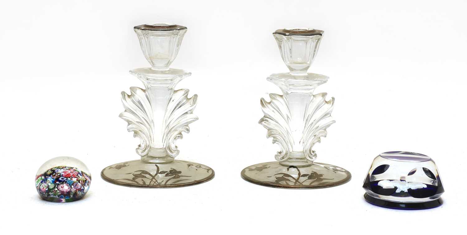 Lot 286 - A pair of clear glass and overlaid candlesticks
