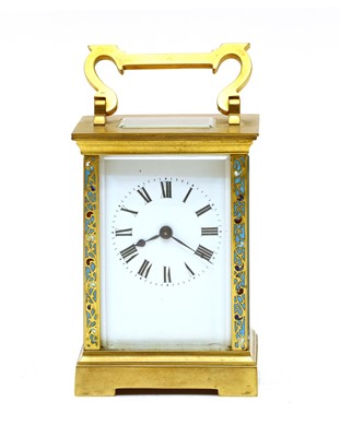 Lot 282 - A French champleve enamelled and brass carriage timepiece