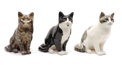 Lot 209 - A collection of three Mike Hinton pottery cats