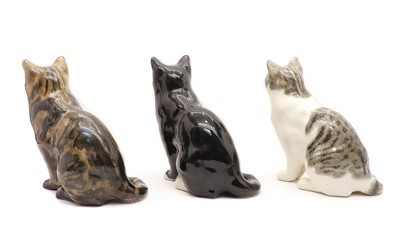 Lot 209 - A collection of three Mike Hinton pottery cats