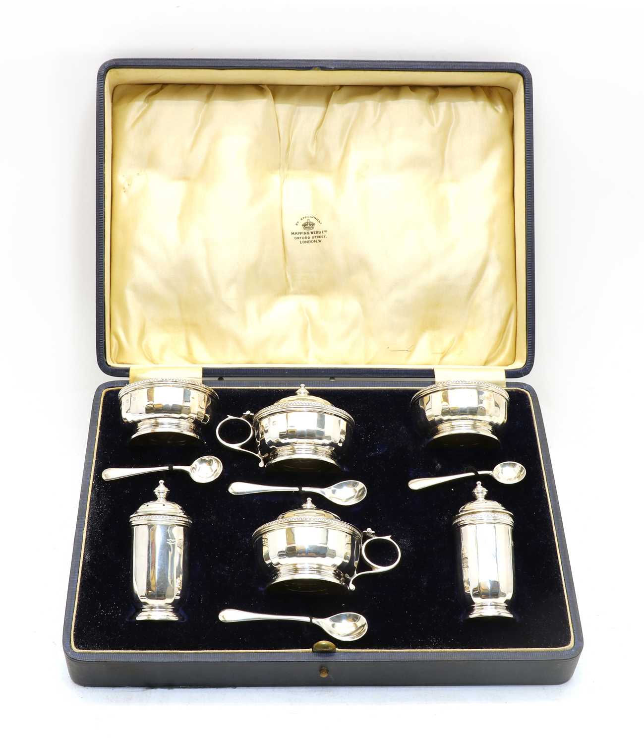 Lot 60 - A cased silver cruet set