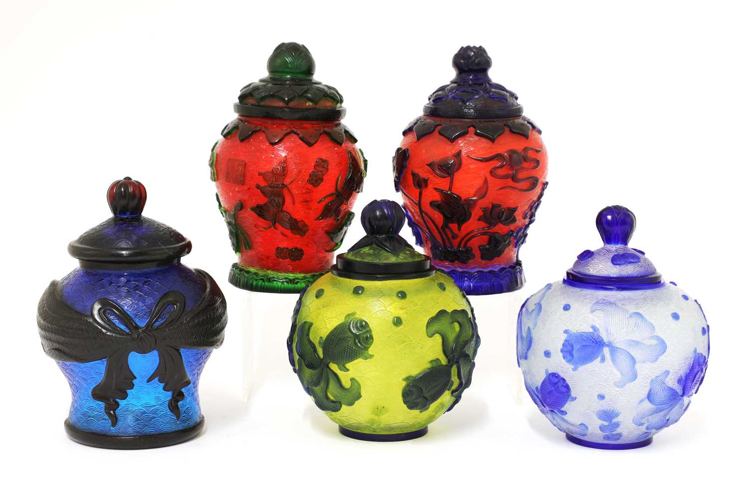 Lot 80 - A collection of five Chinese overlay Peking glass jars and covers
