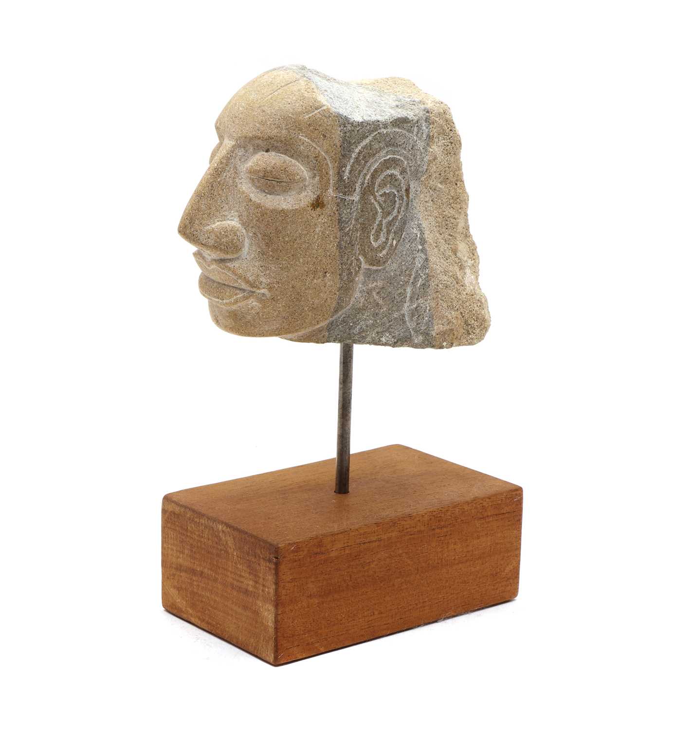Lot 109 - A carved stone head