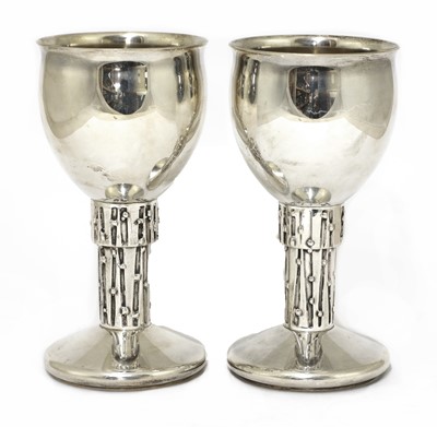 Lot 606 - A pair of silver goblets