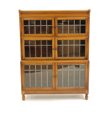 Lot 400 - A three section Minty bookcase