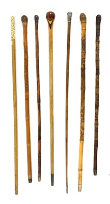 Lot 325 - A collection of Chinese and Japanese walking sticks