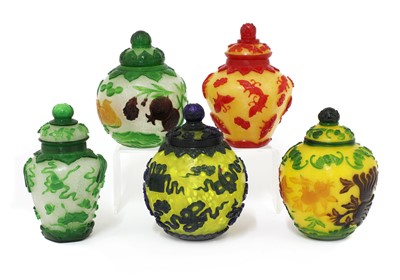 Lot 83 - A collection of five Chinese overlay Peking glass jars and covers
