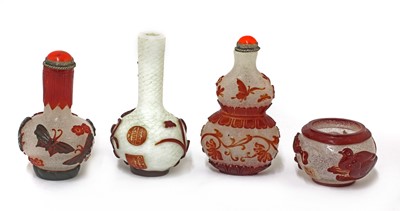 Lot 89 - Three small Chinese overlay Peking glass vases