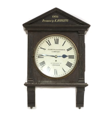 Lot 141 - An Edwardian oak cased wall clock