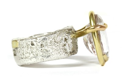 Lot 160 - A sterling silver and 18ct gold single stone ring, by Shelley Thomas