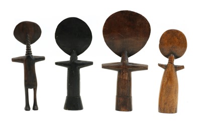 Lot 82 - Four Ashanti carved wooden disc head fertility dolls