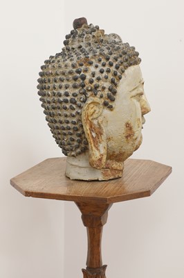 Lot 493 - A cast and painted metal head of Buddha