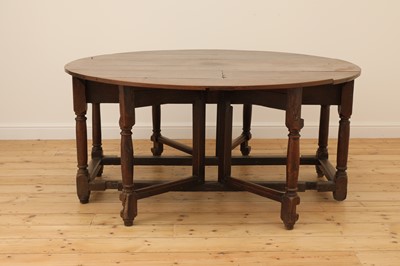 Lot 304 - An oak double gateleg table