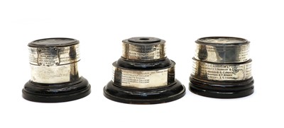 Lot 44 - Three ebonised trophy stands