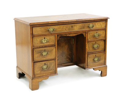 Lot 281 - A Victorian walnut kneehole desk