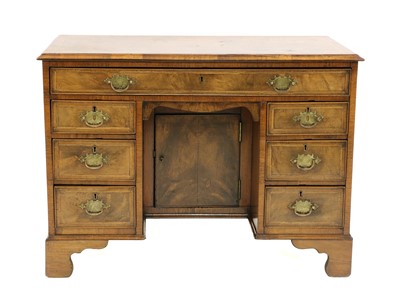 Lot 281 - A Victorian walnut kneehole desk