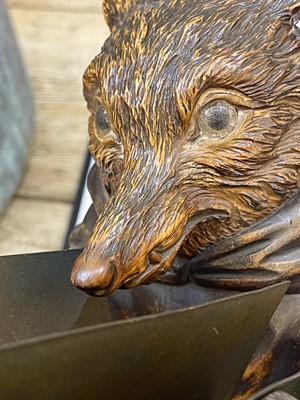 Lot 394 - A Swiss Black Forest carved lindenwood figure of a fox