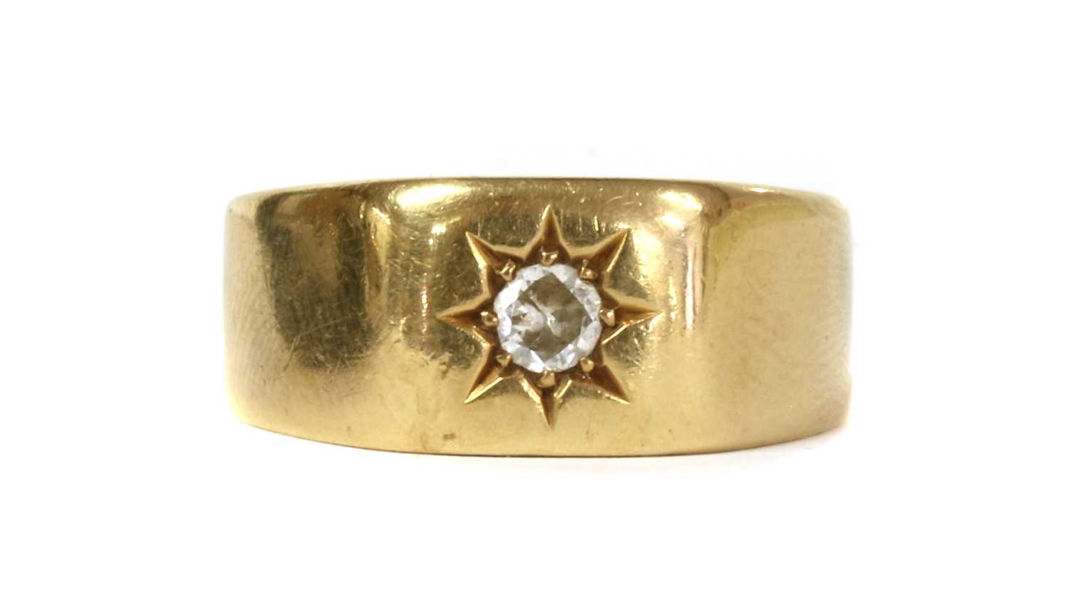 Lot 8 - An 18ct gold single stone diamond set signet ring, by Bravingtons