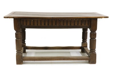 Lot 326 - An oak refectory table