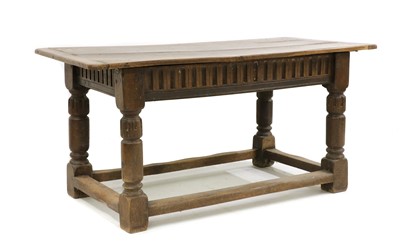 Lot 326 - An oak refectory table