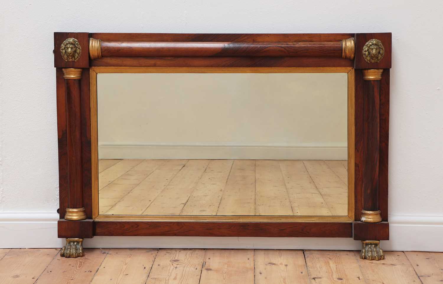 Lot 487 - A Regency rosewood and parcel-gilt overmantel mirror