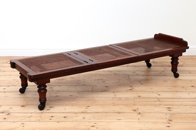 Lot 470 - A Victorian caned campaign daybed