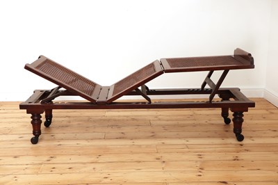 Lot 470 - A Victorian caned campaign daybed