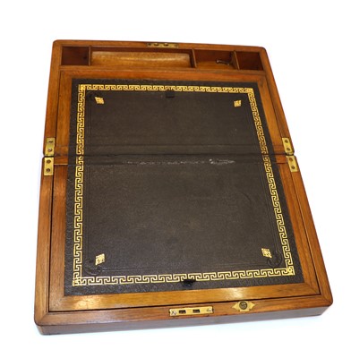 Lot 170 - A Victorian walnut and brass bound writing slope