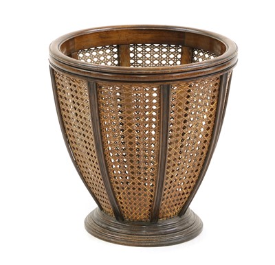 Lot 264 - A mahogany and cane waste paper basket