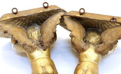 Lot 121 - A pair of carved giltwood wall brackets