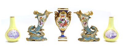 Lot 140 - A pair of porcelain cornucopia vases