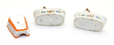Lot 201 - A pair of pottery ornaments