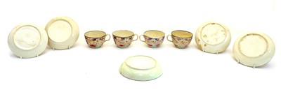 Lot 97 - Four silver lustre pottery teacups and five saucers