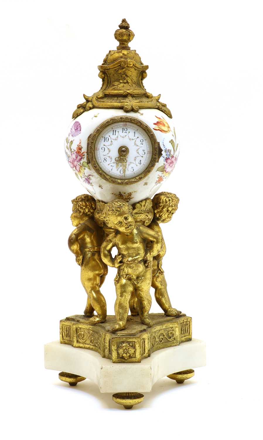 Lot 75 - A Dresden style table clock