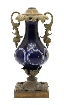 Lot 94 - A blue glass table lamp
