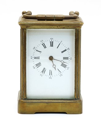 Lot 107 - A brass carriage clock