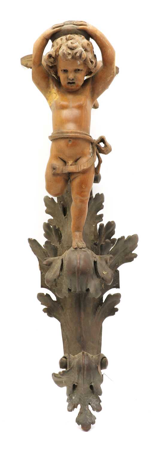 Lot 96 - A carved softwood wall light