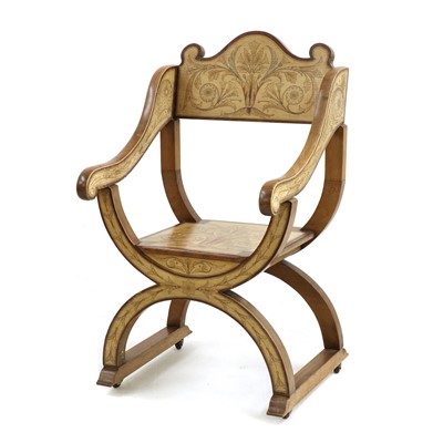 Lot 283 - A walnut Savonarola type chair