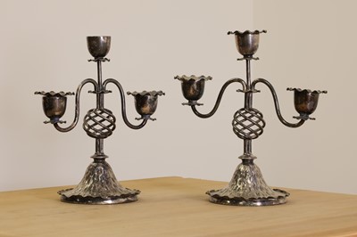 Lot 346 - A pair of silver-plated candlesticks
