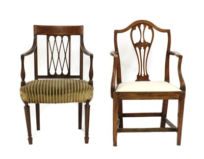 Lot 245 - A Sheraton period strung mahogany elbow chair