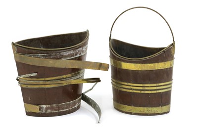 Lot 249 - Two George III mahogany navette shaped brass bound buckets