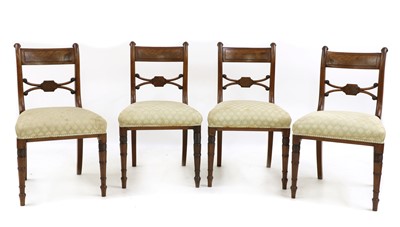 Lot 473 - A set of four George III mahogany bar back single chairs