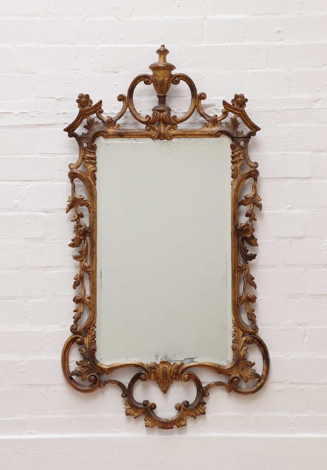 Lot 35 - A George III-style giltwood wall mirror