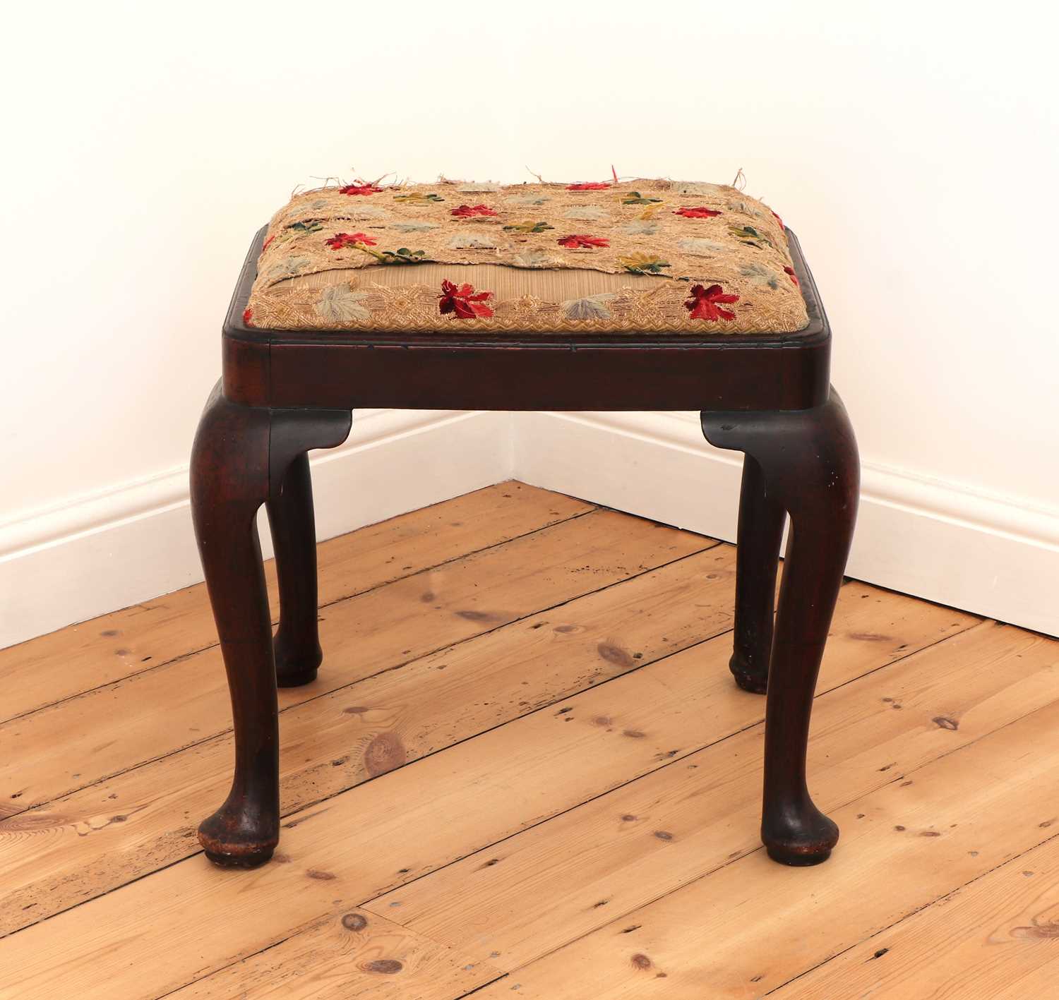 Lot 60 - A George III mahogany stool