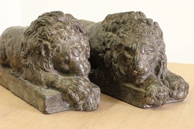 Lot 30 - A pair of cast lead lions after Antonio Canova