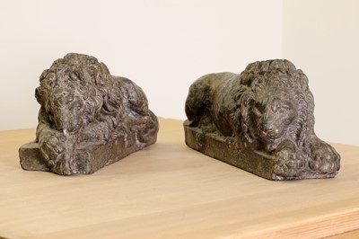 Lot 30 - A pair of cast lead lions after Antonio Canova