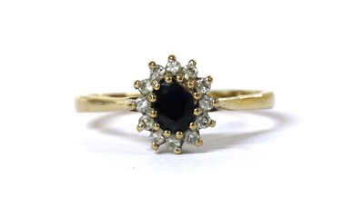 Lot 167 - A 9ct gold sapphire and diamond cluster ring