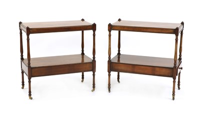 Lot 532 - A pair of yew wood lamp tables of two tiers